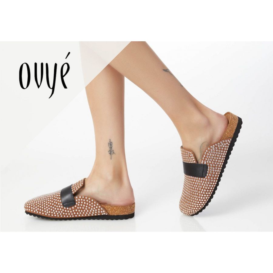 Scarpe donna con borchie su Ovyé, un viaggio nella storia e nei tipi di calzature